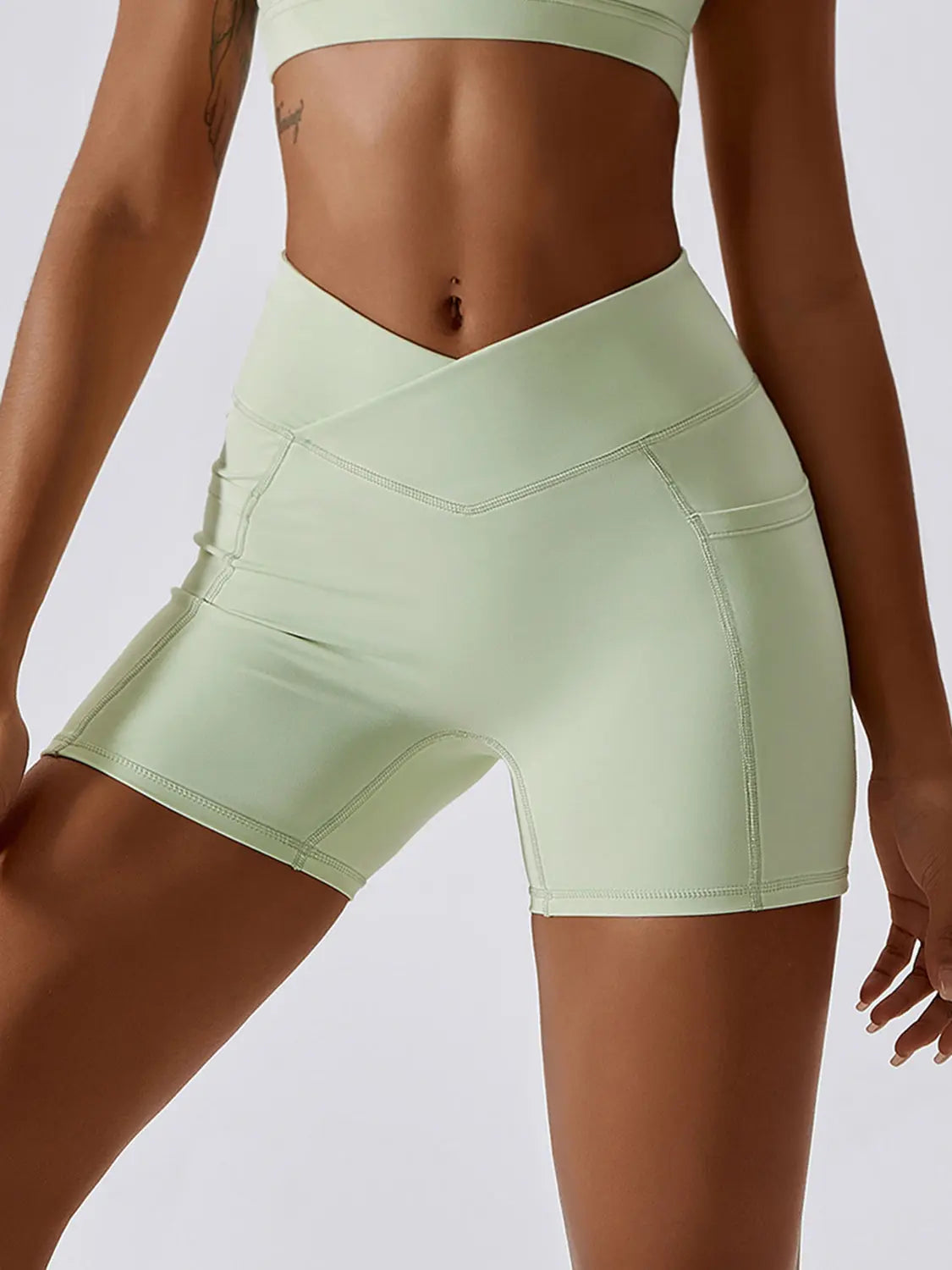 Ruched Pocketed High Waist Active Shorts Trendsi