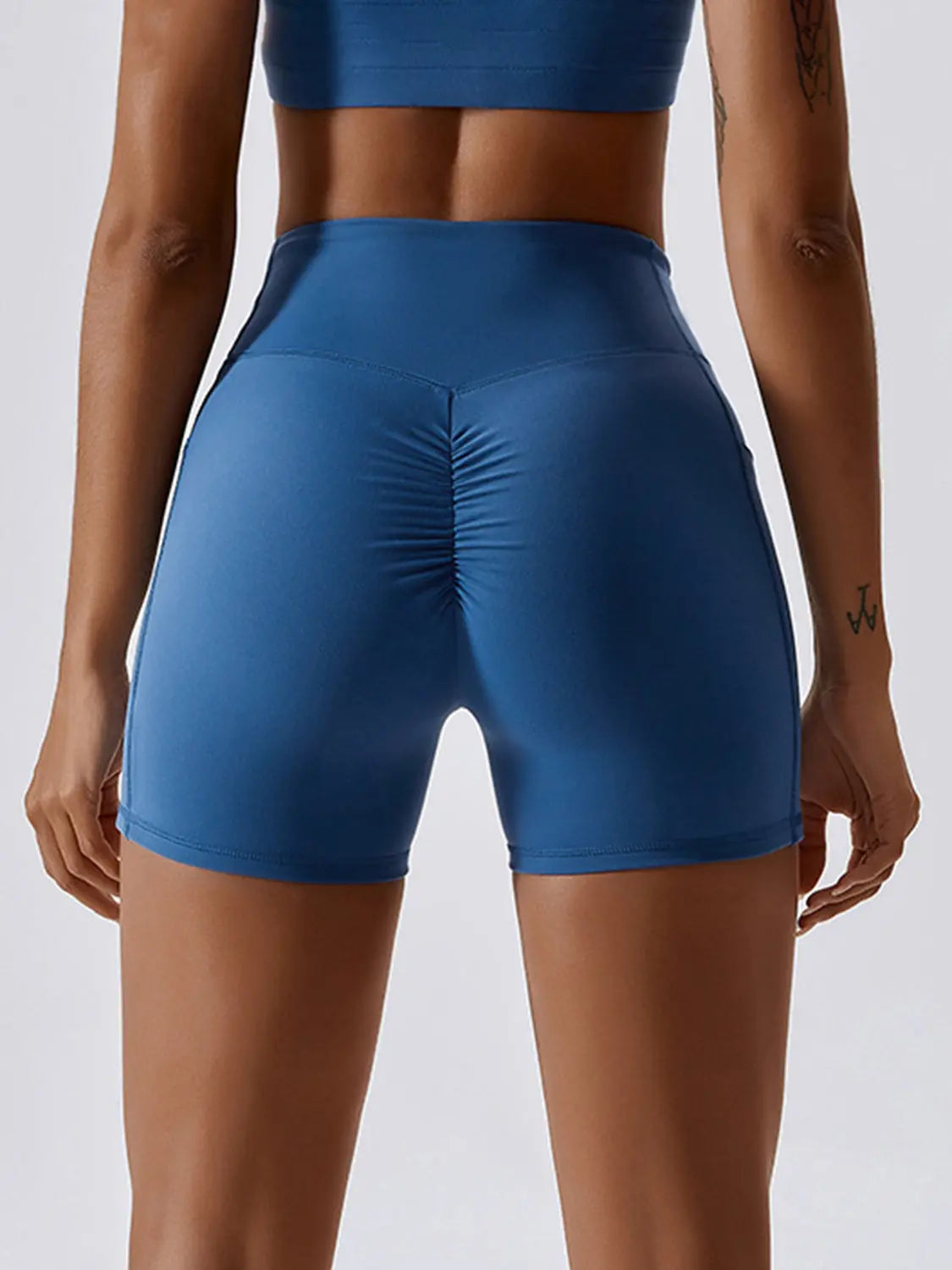 Ruched Pocketed High Waist Active Shorts Trendsi