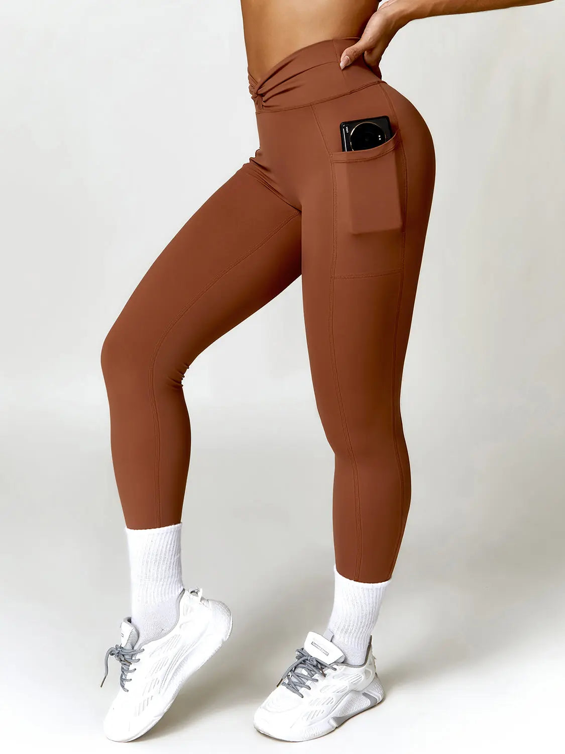 Twisted High Waist Active Pants with Pockets Trendsi