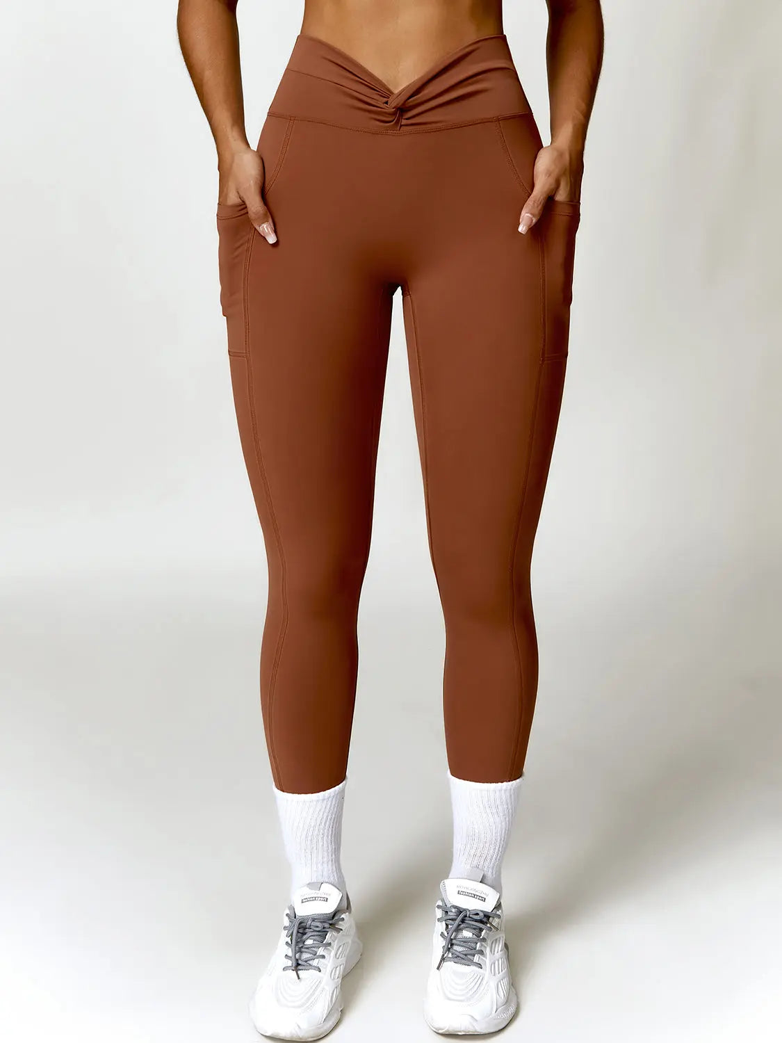 Twisted High Waist Active Pants with Pockets Trendsi