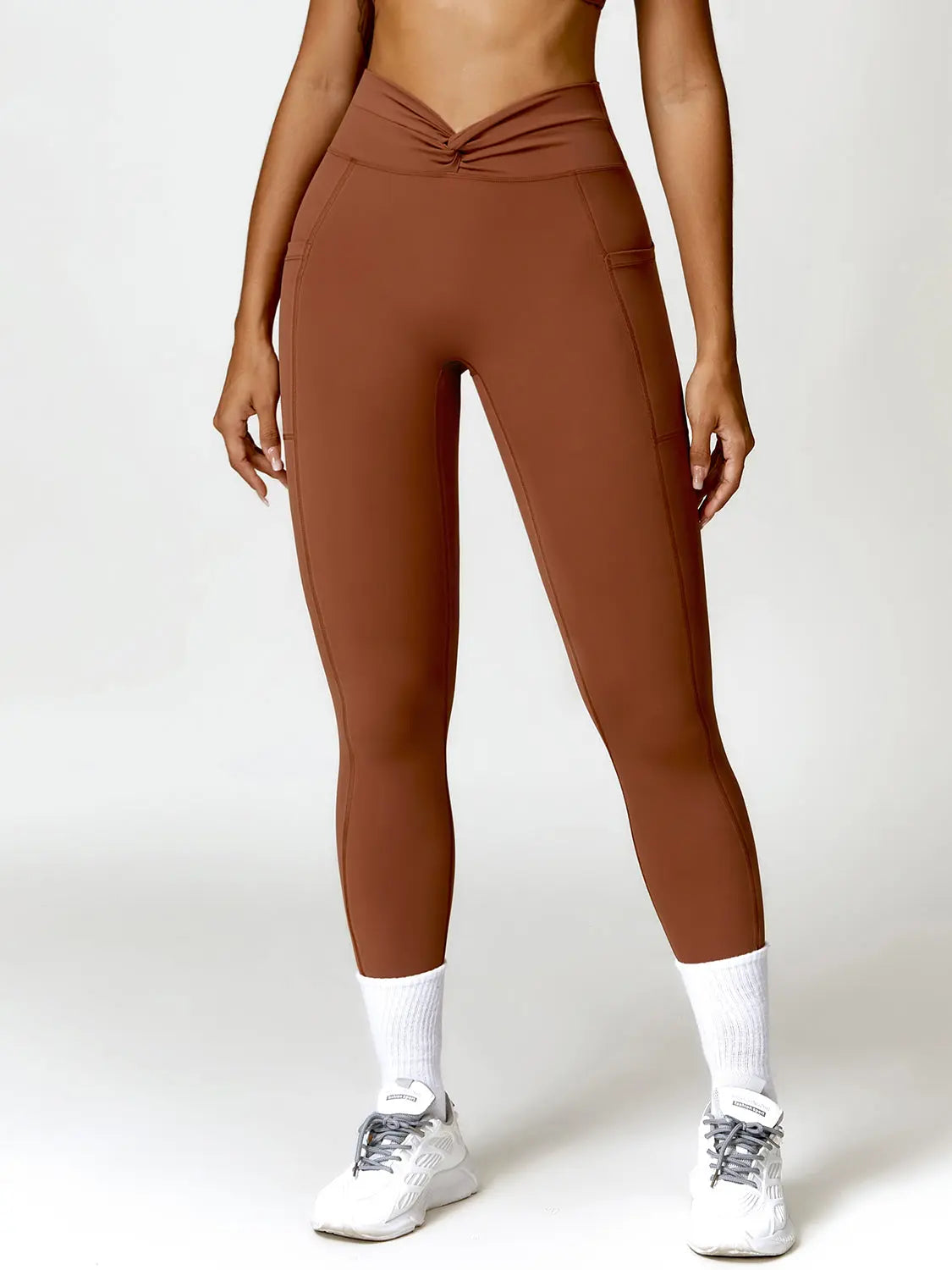 Twisted High Waist Active Pants with Pockets Trendsi