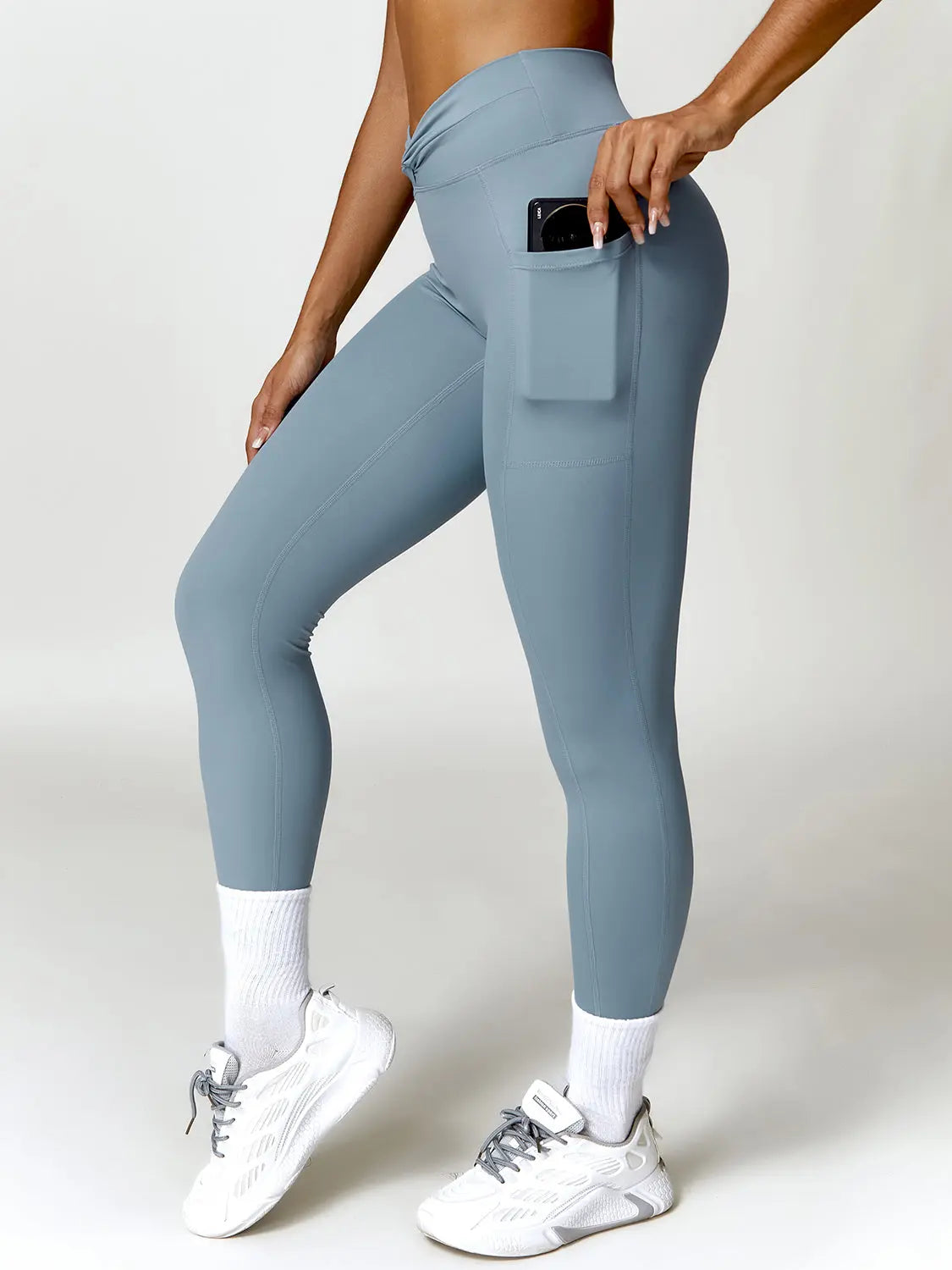 Twisted High Waist Active Pants with Pockets Trendsi