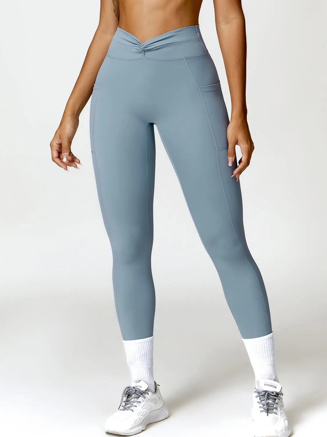 Twisted High Waist Active Pants with Pockets Trendsi