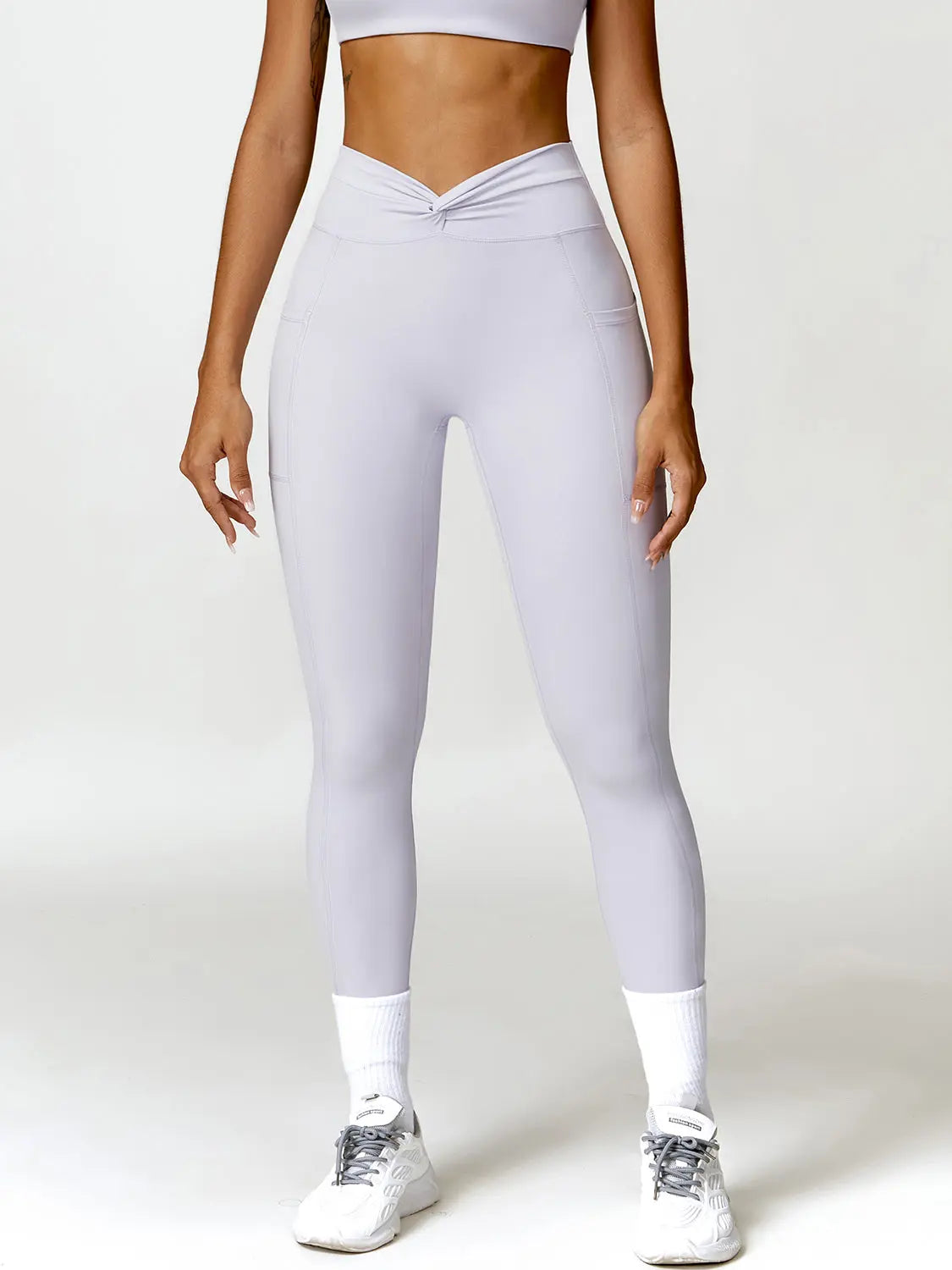 Twisted High Waist Active Pants with Pockets Trendsi