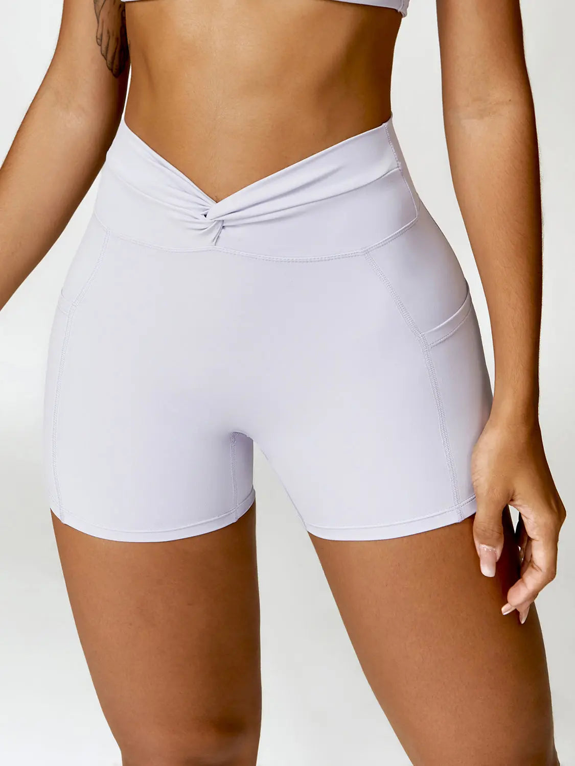 Twisted High Waist Active Shorts with Pockets Trendsi