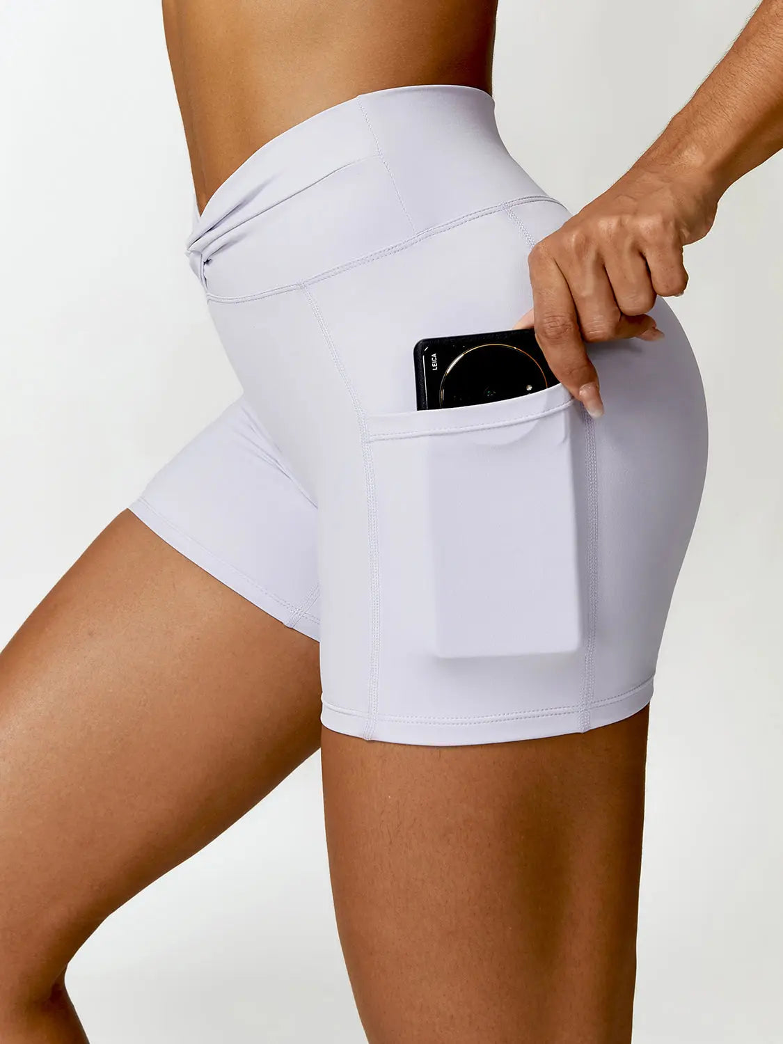 Twisted High Waist Active Shorts with Pockets Trendsi